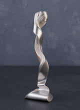 Un Silver Candlestick